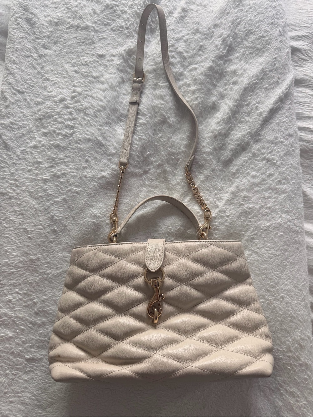 Edie Quilted Leather Top Handle
Satchel